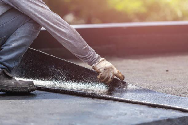 Professional Emergency Waterproofing technician working in Huron, IN